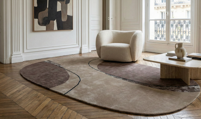 Tapis aux formes organiques et tapis carré, tendance 2026