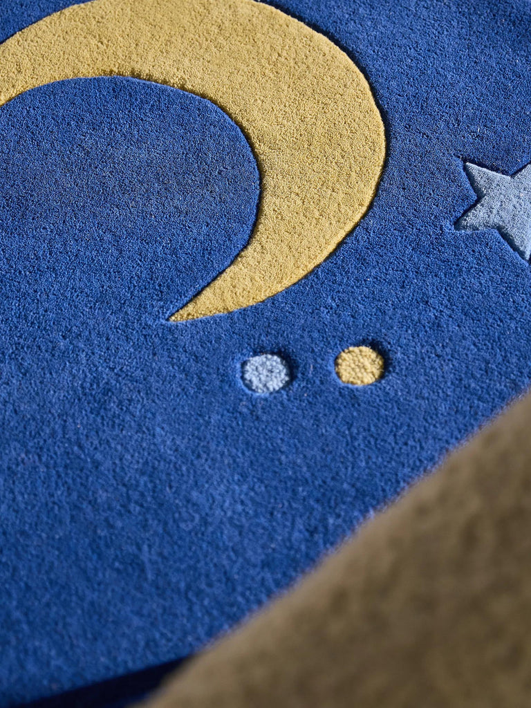 Tapis étoile rond enfant bleu en laine 120 cm de diamètre