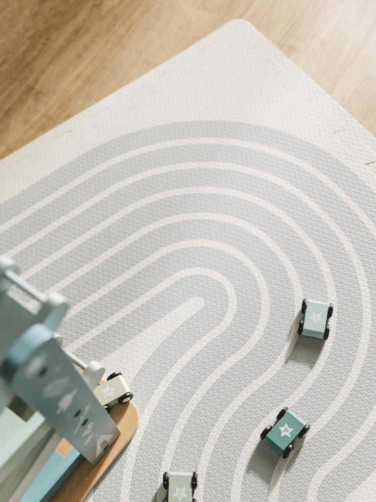 Tapis moderne de jeux puzzle enfant crème et gris 120x180 cm