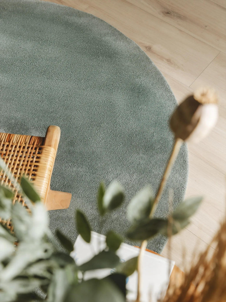 Tapis moderne uni rond vert en laine 150 cm de diamètre