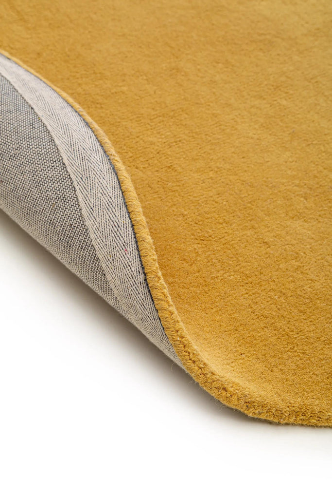 Tapis moderne uni rond marron camel en laine 150 cm de diamètre