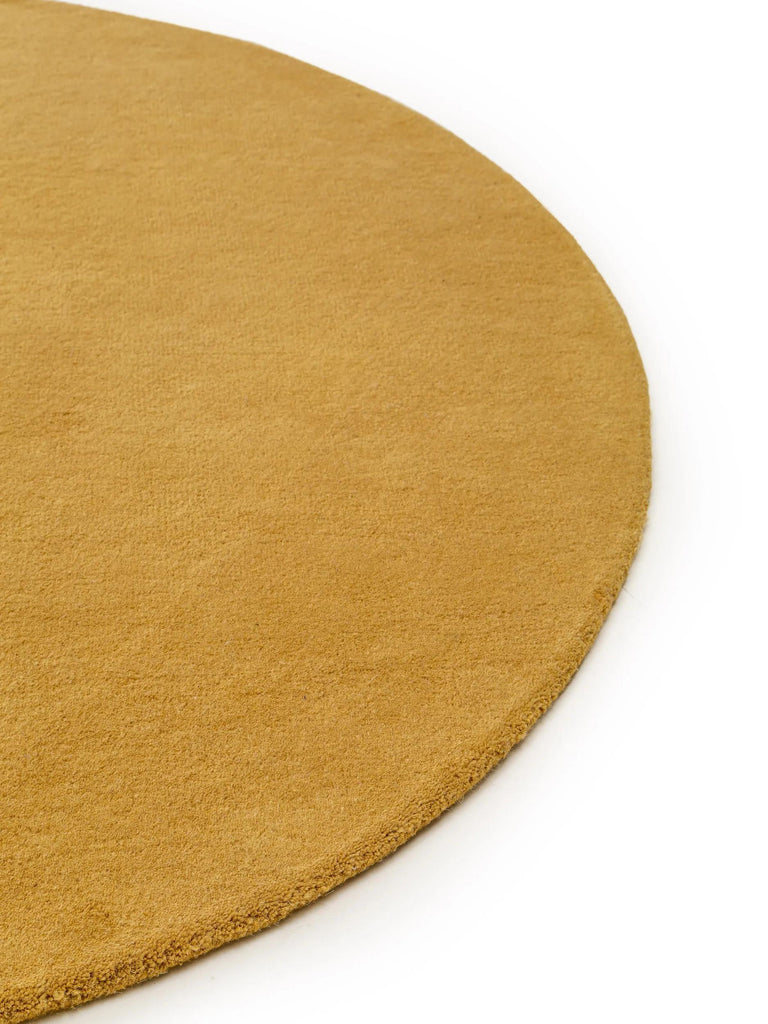 Tapis moderne uni rond marron camel en laine 150 cm de diamètre