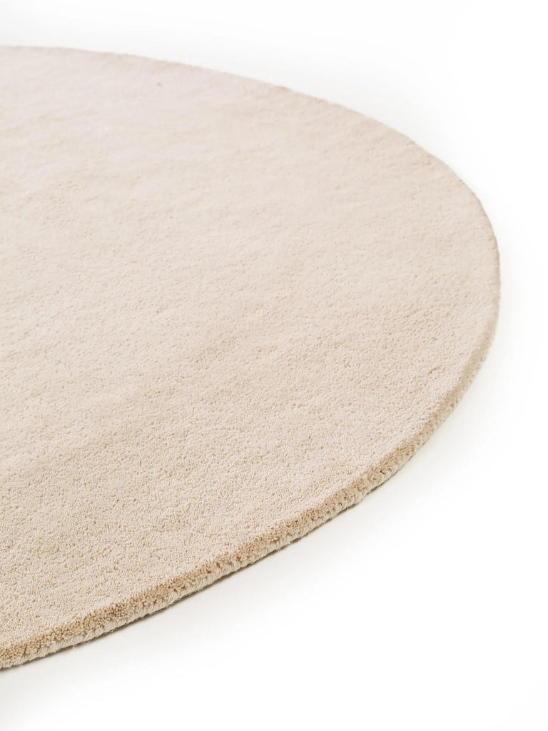 Tapis moderne uni rond crème en laine 100 cm de diamètre