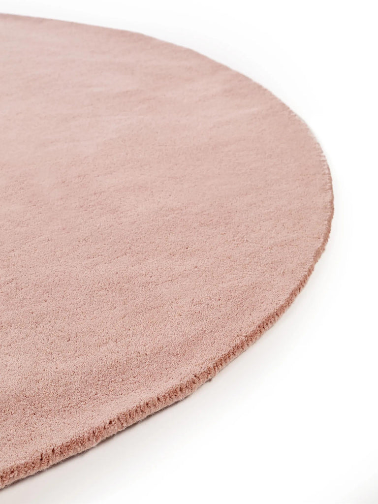 Tapis moderne uni rond rose en laine 150 cm de diamètre