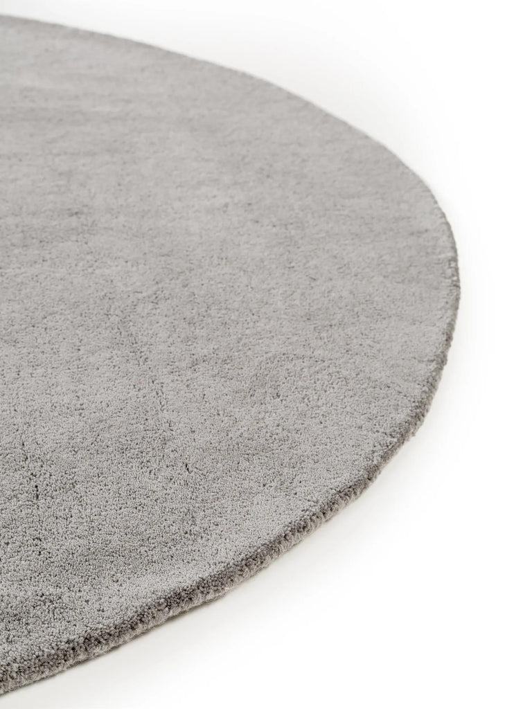 Tapis moderne uni rond gris en laine 150 cm de diamètre