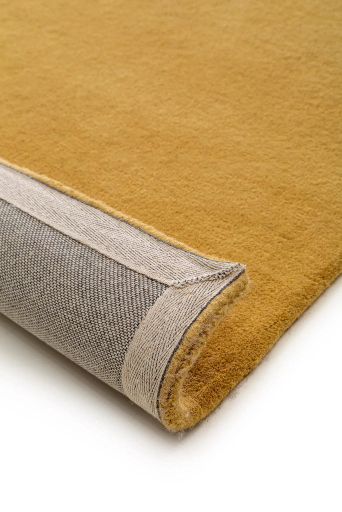 Tapis moderne uni marron camel en laine 160x230 cm