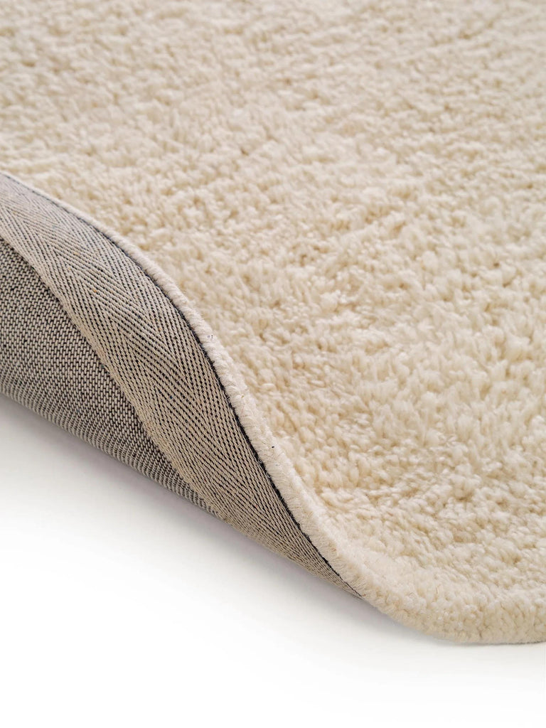 Tapis berbère uni rond crème en laine 200 cm de diamètre