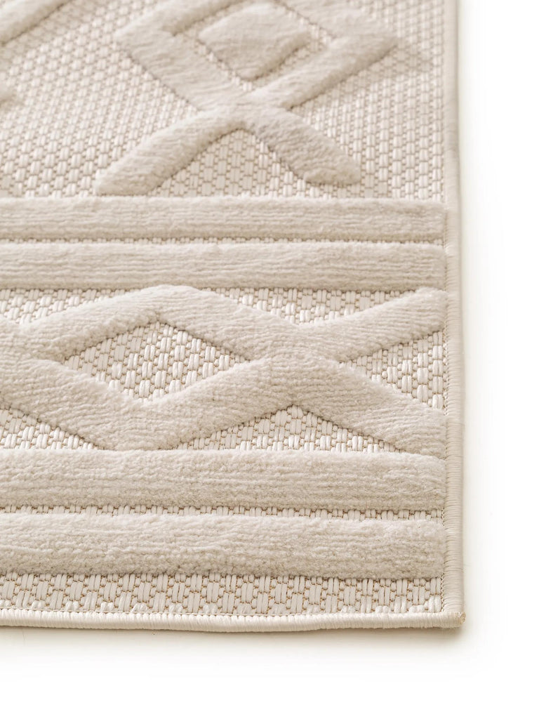 Tapis géométrique motif ethnique relief crème d'intérieur et d'extérieur 80x150 cm