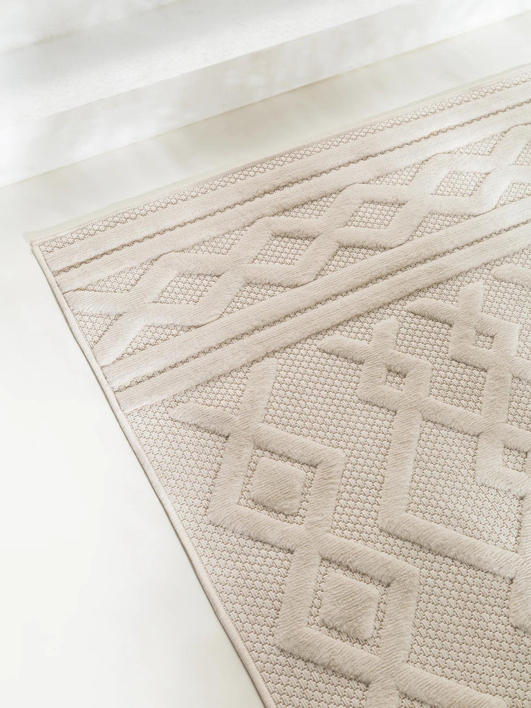 Tapis géométrique motif ethnique relief crème d'intérieur et d'extérieur 80x150 cm