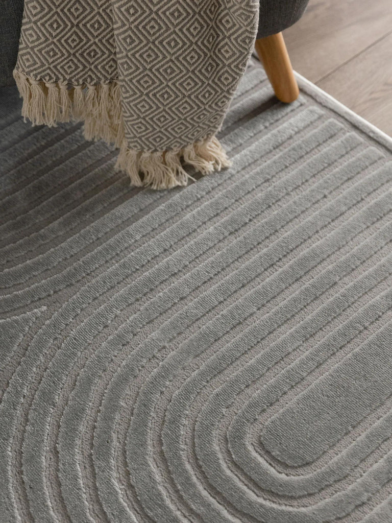 Tapis moderne en relief courbes gris 140x200 cm
