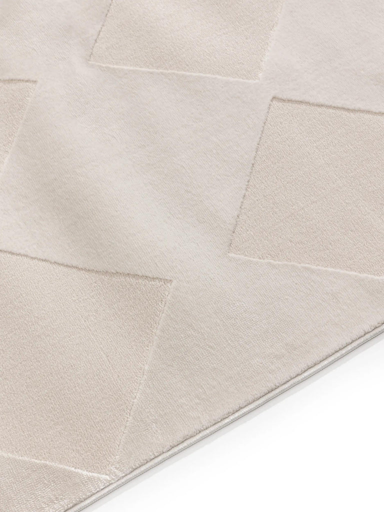 Tapis géométrique motif losange relief crème 140x200 cm