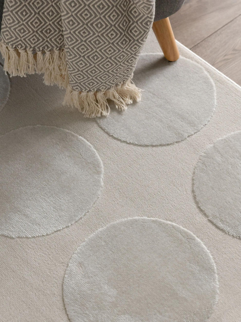 Tapis contemporain motif rond relief blanc 160x230 cm
