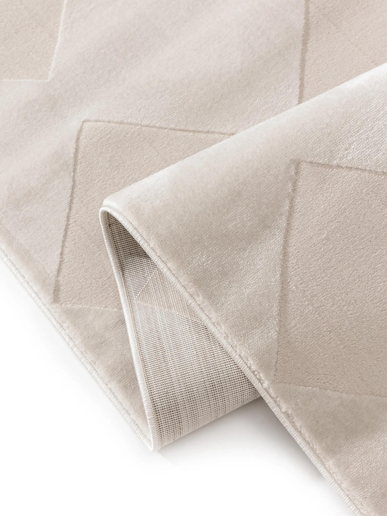 Tapis géométrique motif losange relief crème 120x170 cm
