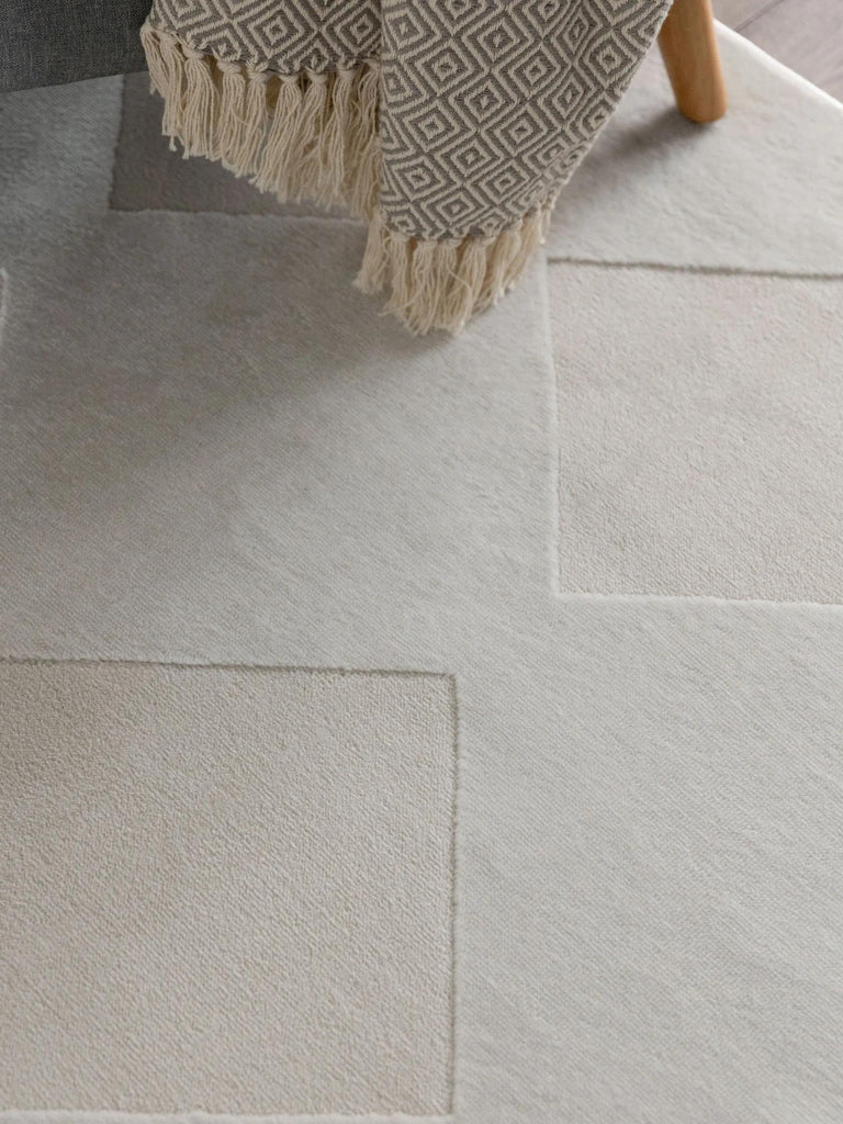 Tapis géométrique motif carré relief crème 240x340 cm