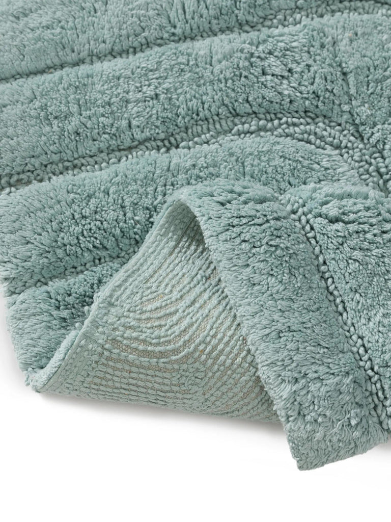 Tapis géométrique design de bain vert d'eau en coton 70x120 cm