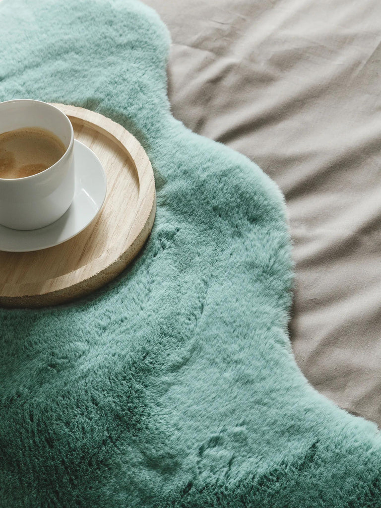 Tapis shaggy peau fausse fourrure turquoise 60x90 cm