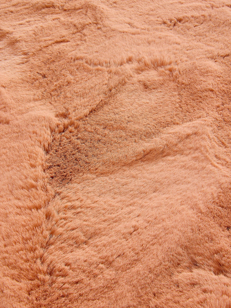 Tapis shaggy fausse fourrure rond corail 80 cm de diamètre