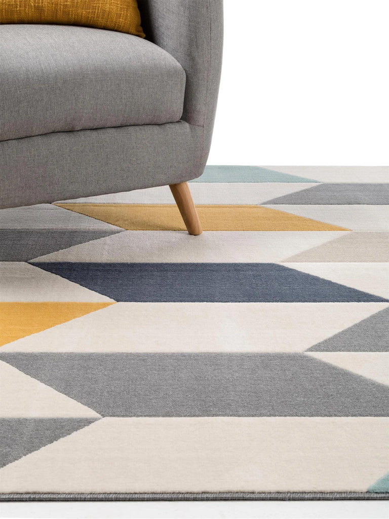 Tapis moderne motif géométrique beige bleu et jaune 140x200 cm