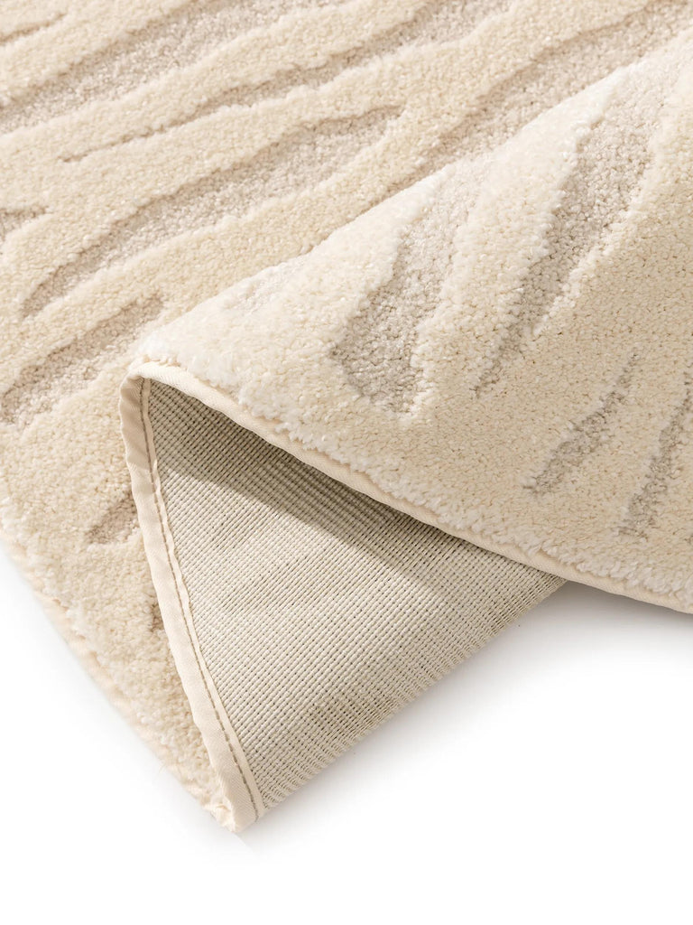 Tapis contemporain motif racines rond crème 200 cm de diamètre