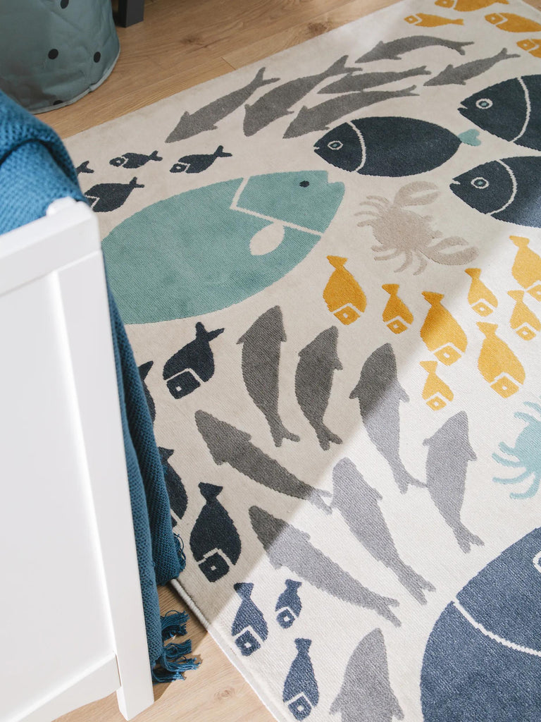 Tapis moderne motif marin enfant beige bleu et orange 120x170 cm