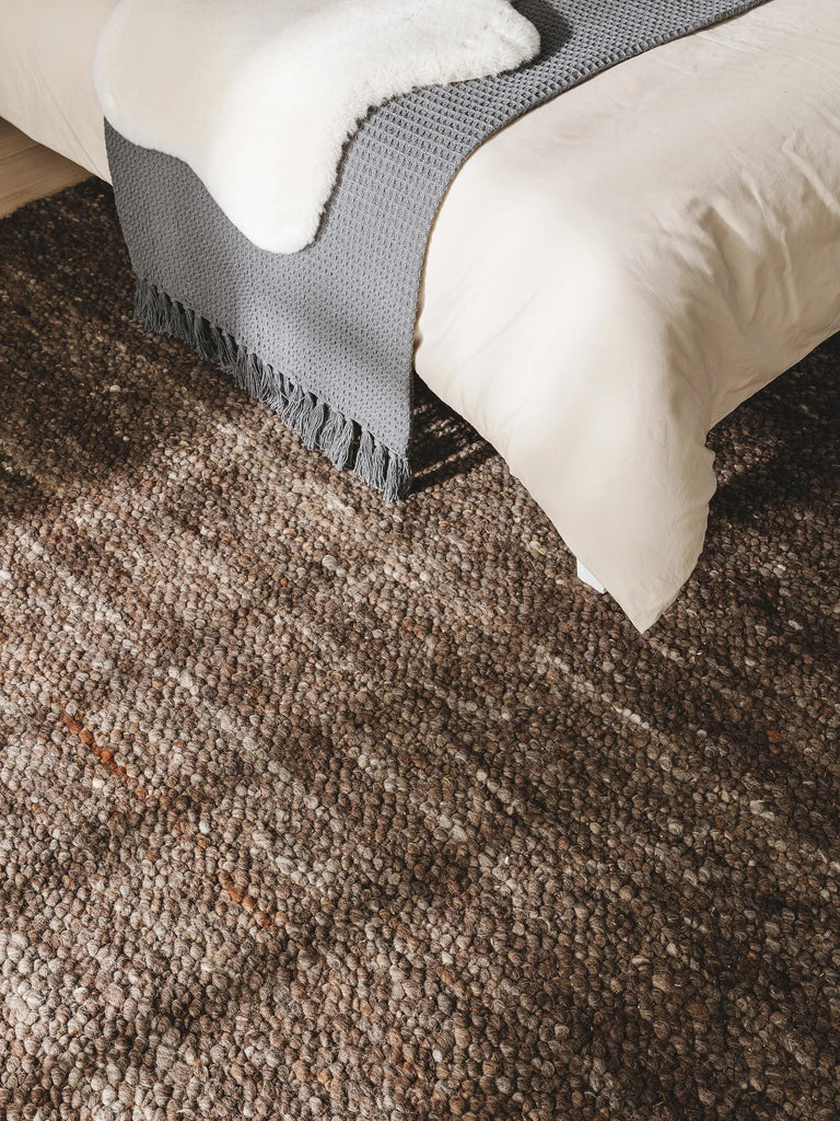 Tapis scandinave tressé marron en laine 100x150 cm