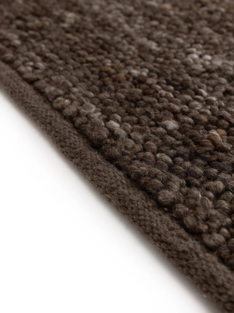 Tapis scandinave tressé marron en laine 100x150 cm