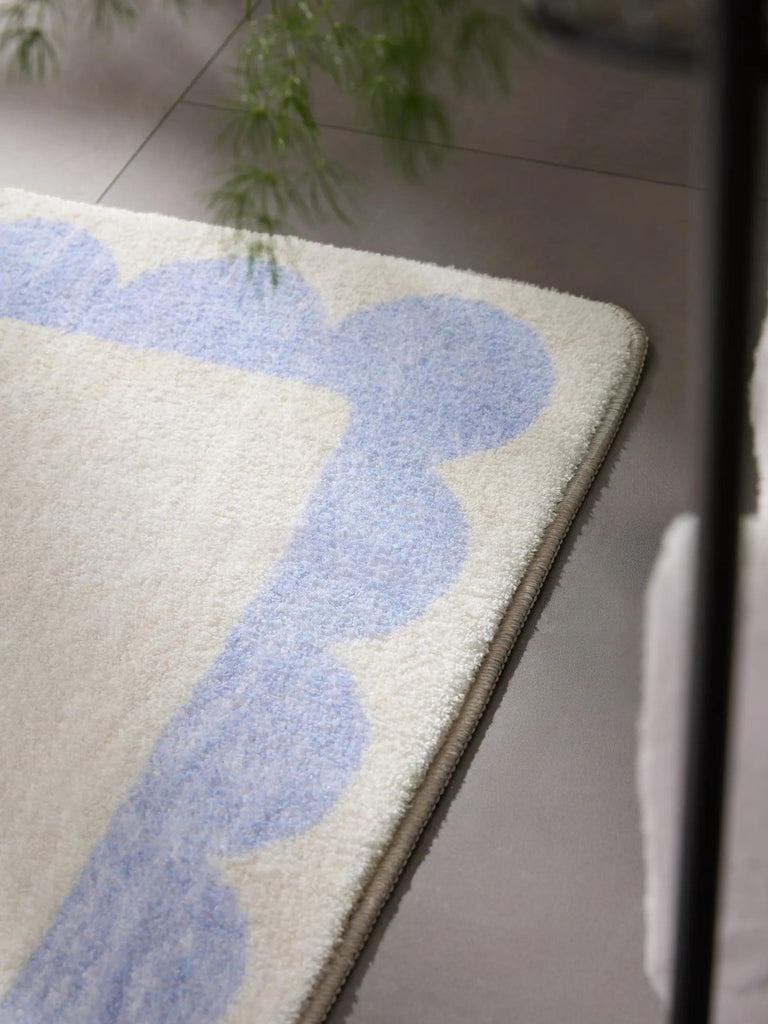 Tapis moderne encadrement retro de bain beige et violet 50x80 cm