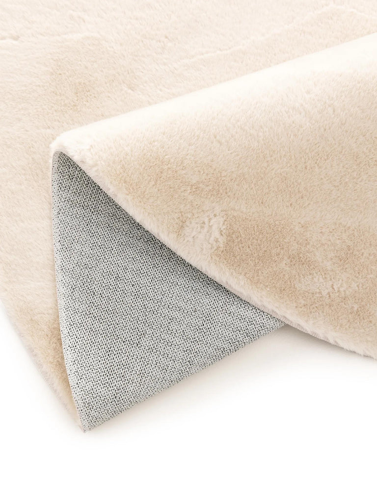 Tapis moderne fausse fourrure rond beige 80 cm de diamètre