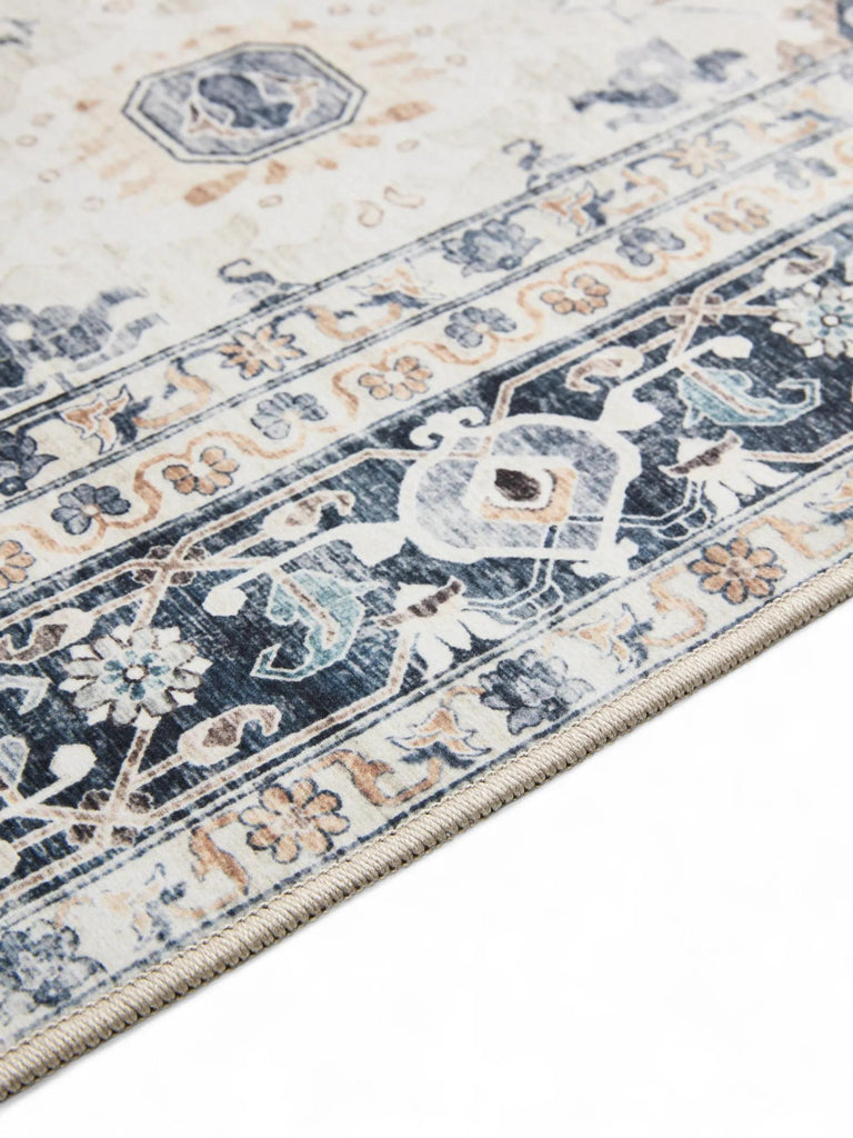 Tapis vintage motif ethnique blanc et bleu lavable 120x170 cm
