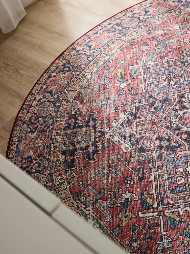 Tapis oriental rond multicolore tons bordeaux lavable 160 cm de diamètre