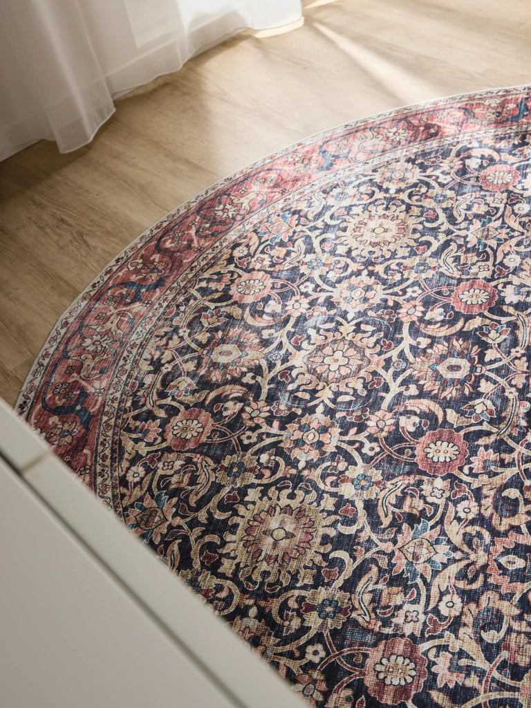 Tapis oriental vintage rond noir et marron lavable 120 cm de diamètre