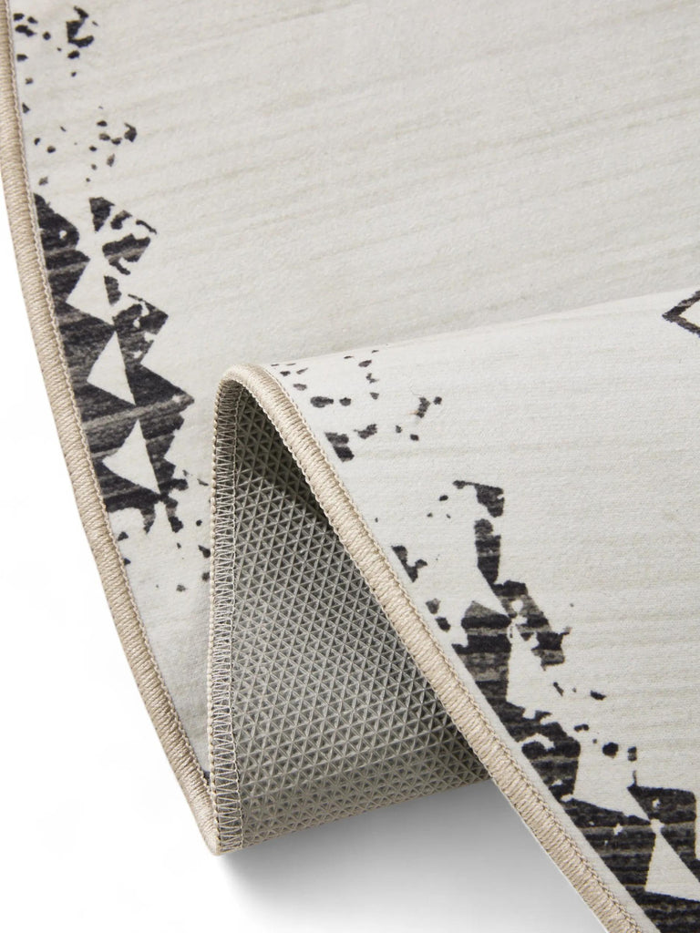 Tapis ethnique inspiration berbère rond beige et bleu lavable 120 cm de diamètre