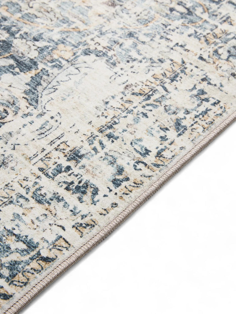 Tapis vintage motif floral beige et bleu lavable 120x170 cm