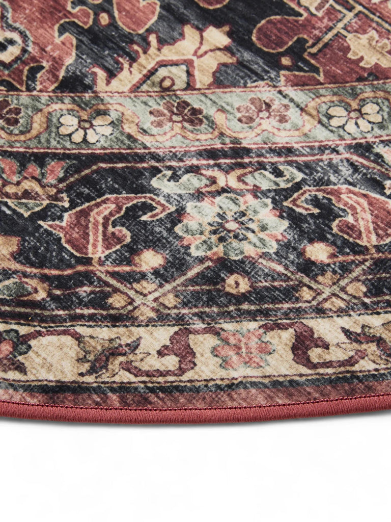 Tapis vintage motif ethnique rond bordeaux et noir lavable 120 cm de diamètre