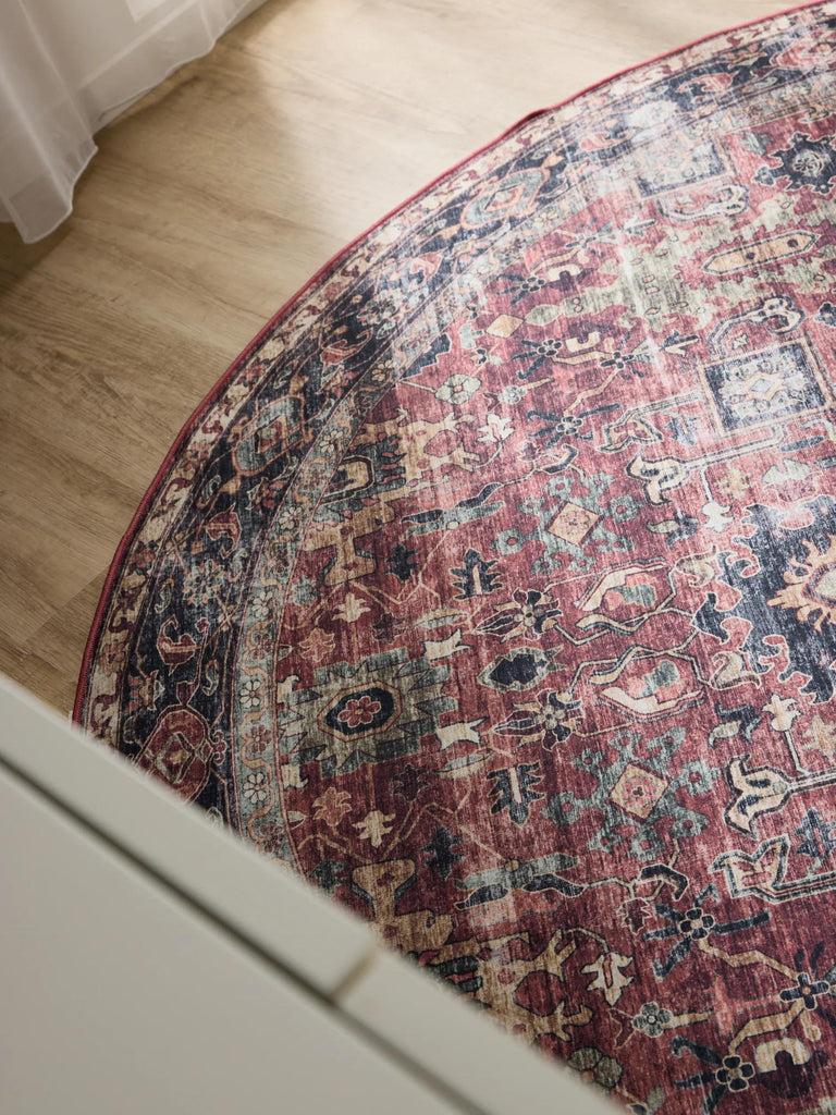 Tapis vintage motif ethnique rond bordeaux et noir lavable 120 cm de diamètre