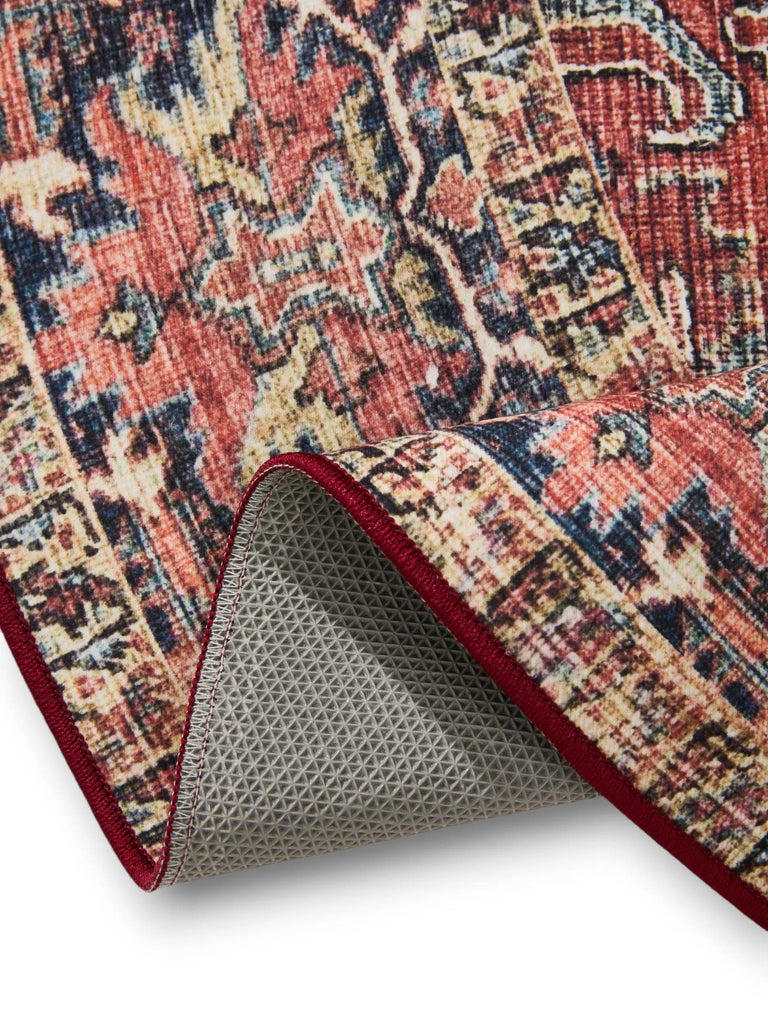 Tapis oriental rond multicolore tons bordeaux lavable 120 cm de diamètre