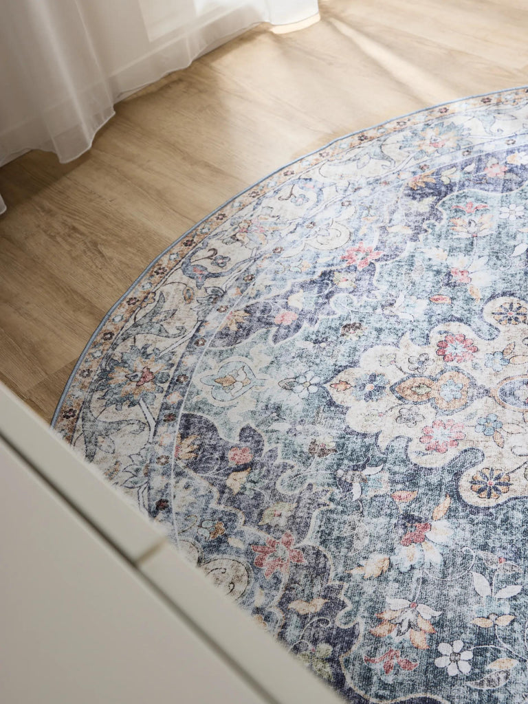 Tapis oriental vintage rond bleu lavable 120 cm de diamètre