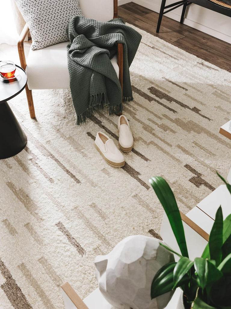 Tapis moderne motif abstrait crème et beige en laine 120x170 cm