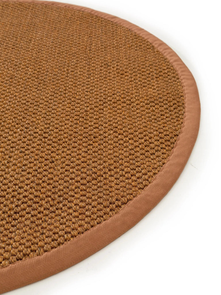 Tapis scandinave uni tressé rond orange rouille en sisal 150 cm de diamètre