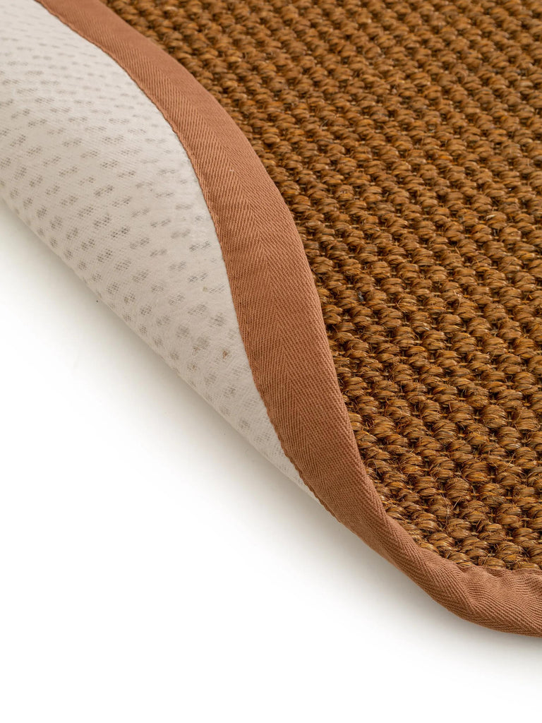 Tapis scandinave uni tressé rond orange rouille en sisal 150 cm de diamètre