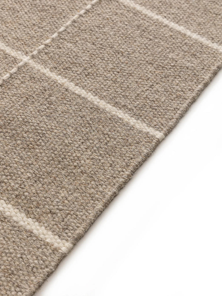 Tapis moderne motif grille géométrique taupe en laine 120x170 cm