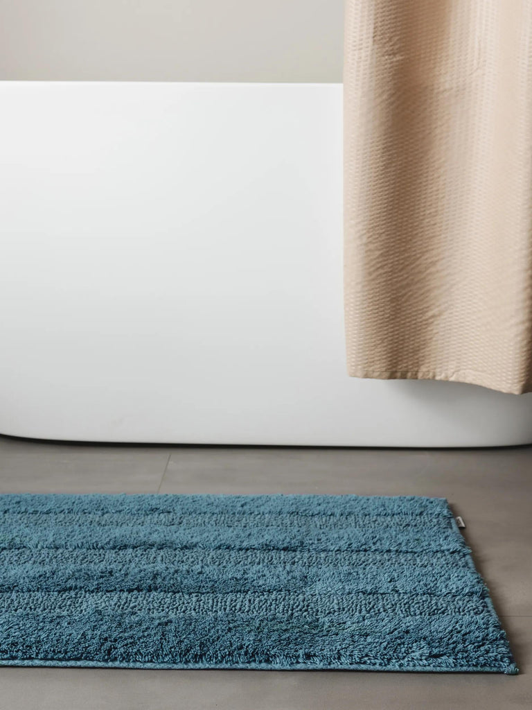 Tapis moderne motif rayé de bain bleu pétrole en coton 50x80 cm