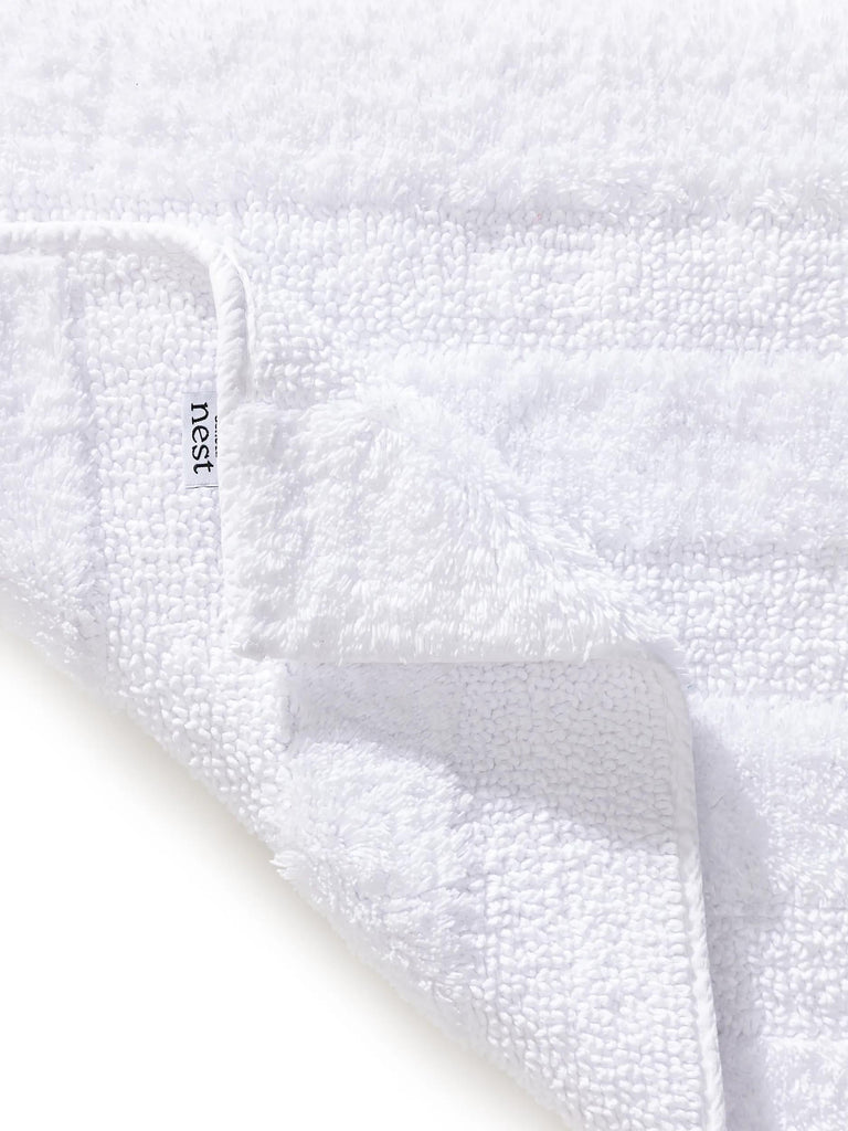 Tapis moderne motif rayé de bain blanc en coton 50x80 cm