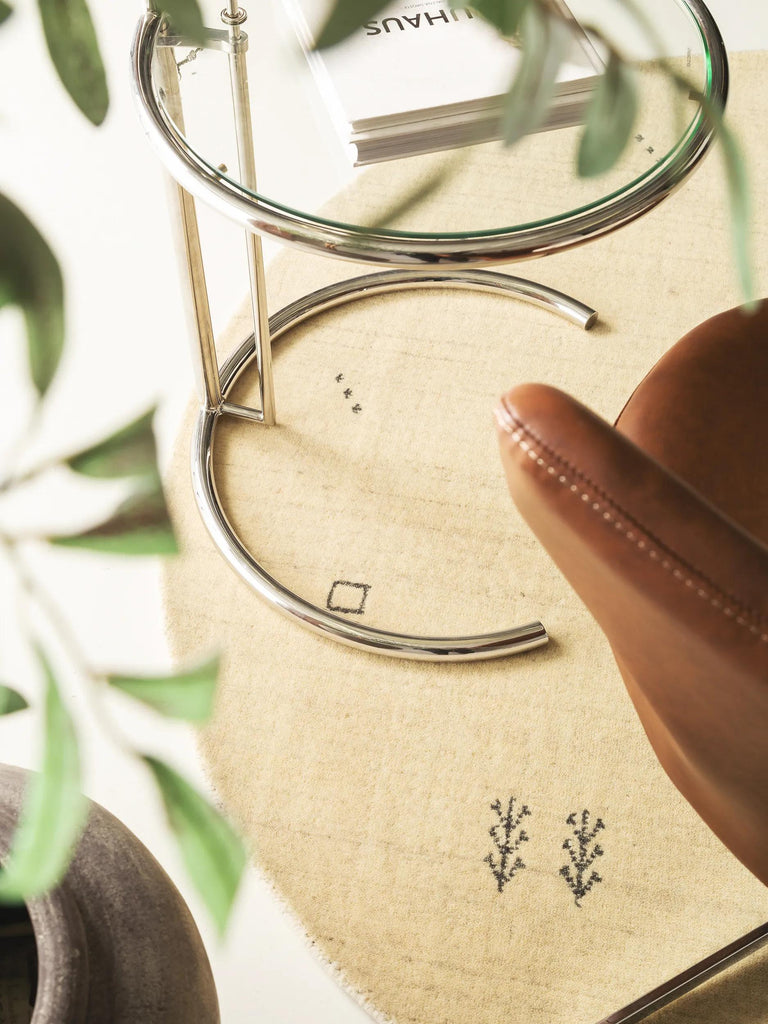 Tapis moderne motif ethnique rond beige en laine 160 cm de diamètre