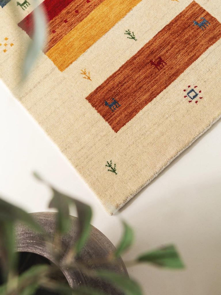 Tapis ethnique inspiration berbère descente de lit multicolore et beige en laine 80x250 cm