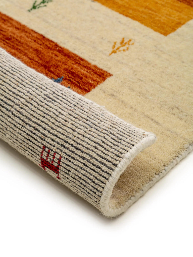 Tapis ethnique inspiration berbère descente de lit multicolore et beige en laine 80x250 cm
