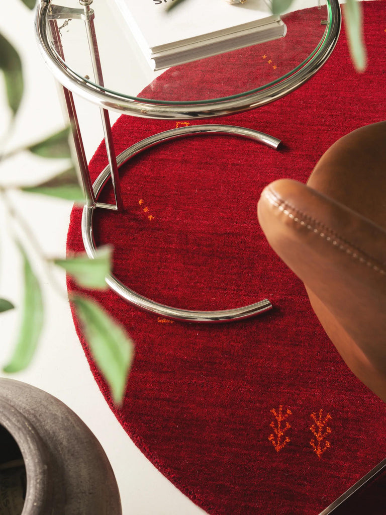 Tapis moderne motif ethnique rond bordeaux en laine 160 cm de diamètre