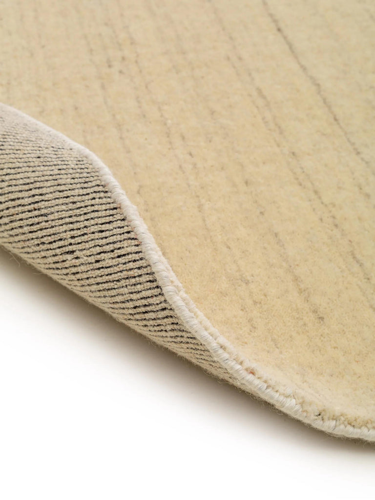 Tapis moderne chiné rond crème en laine 120 cm de diamètre