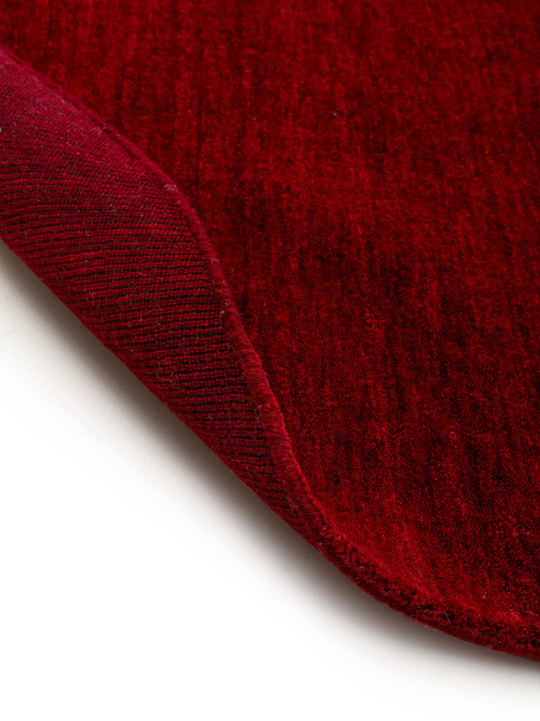 Tapis moderne chiné rond bordeaux en laine 160 cm de diamètre