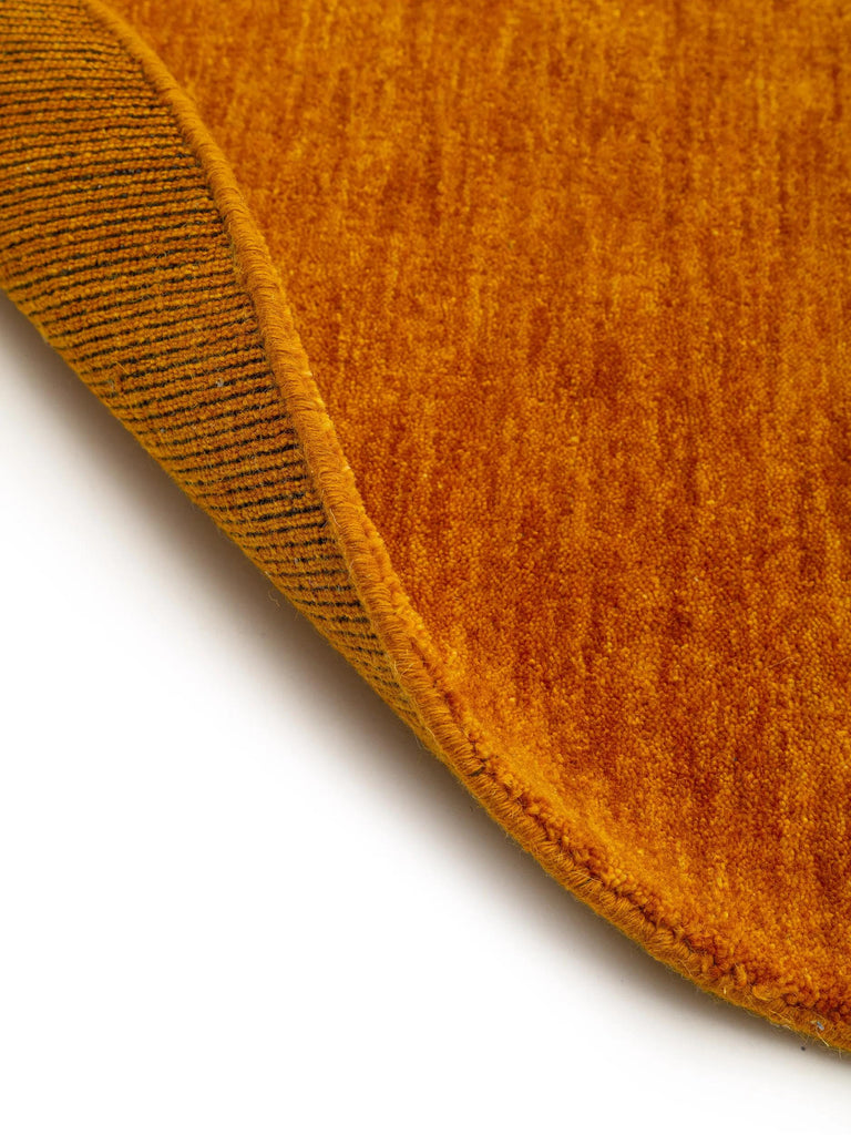 Tapis moderne chiné rond orange en laine 160 cm de diamètre